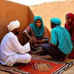 수단 아랍화 정책 영향 - **Prompt:** A bustling, vibrant historical marketplace (souq) in a Nubian town in Sudan, perhaps rem...